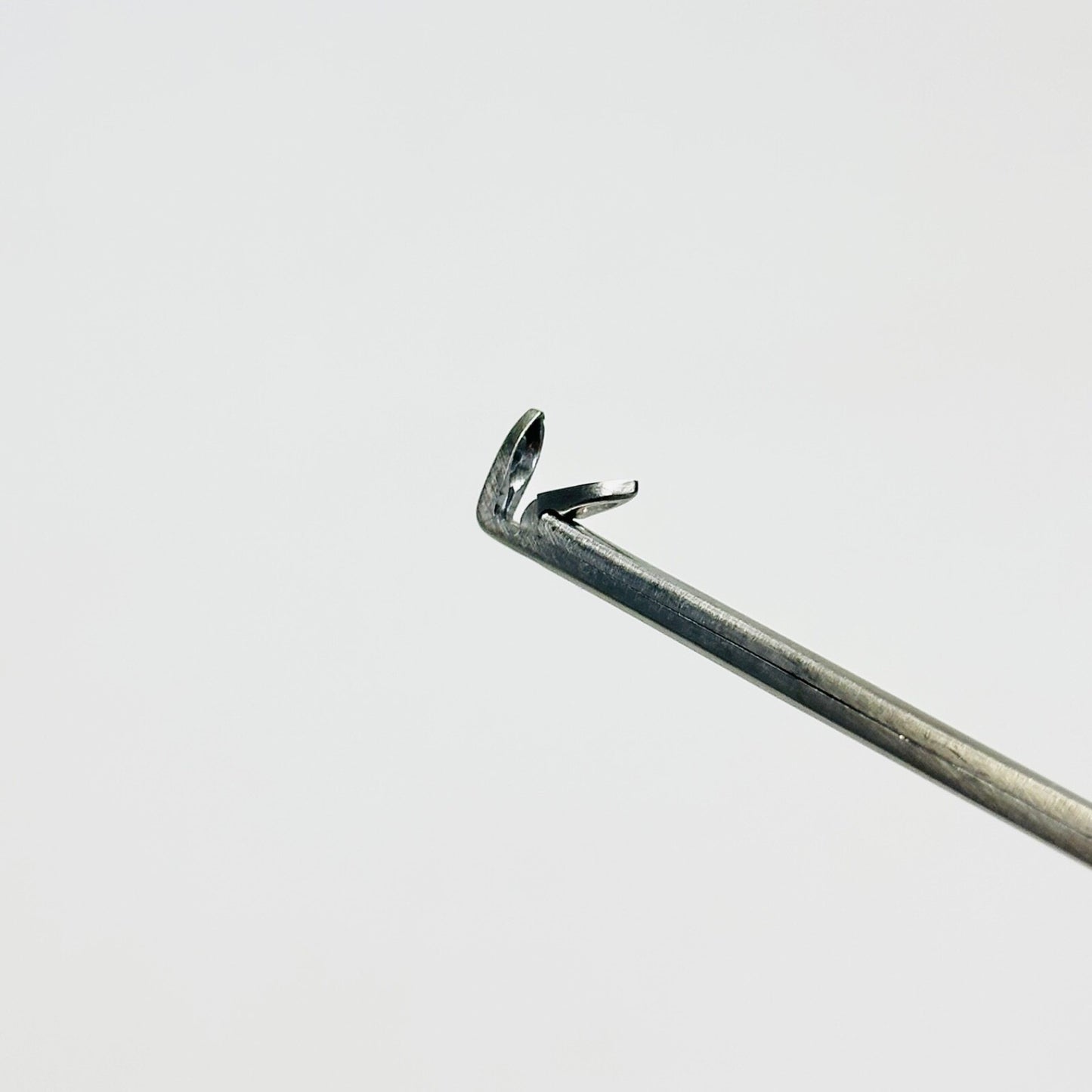 K. STORZ 634825B STRUMPEL Forceps with Oval, Fenestrated, Cupped J Instrument